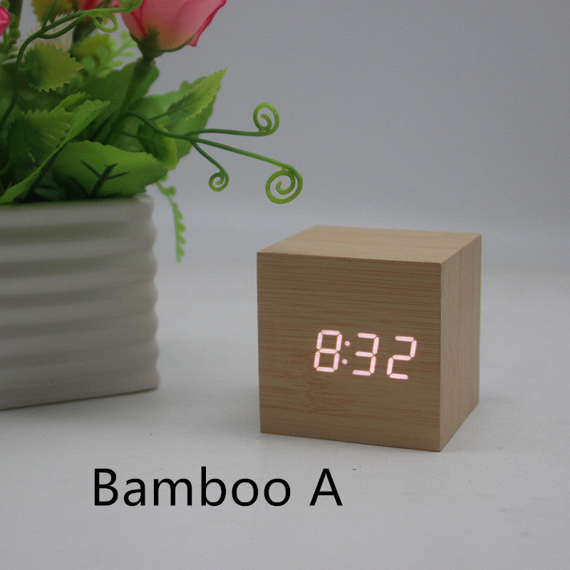 Minimalist Cube shaped sound-sensitive wooden digital clock with temperature display